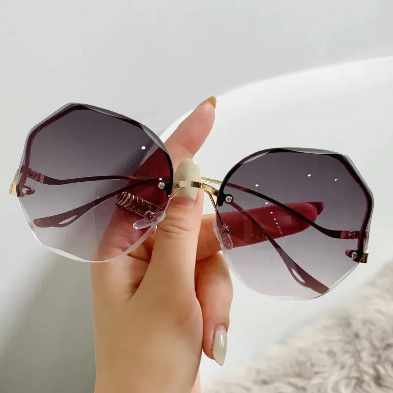 2024 Luxury Round Gradient Metal Curved Ocean Rimless Fashion Sun Eyewear Sunglasses